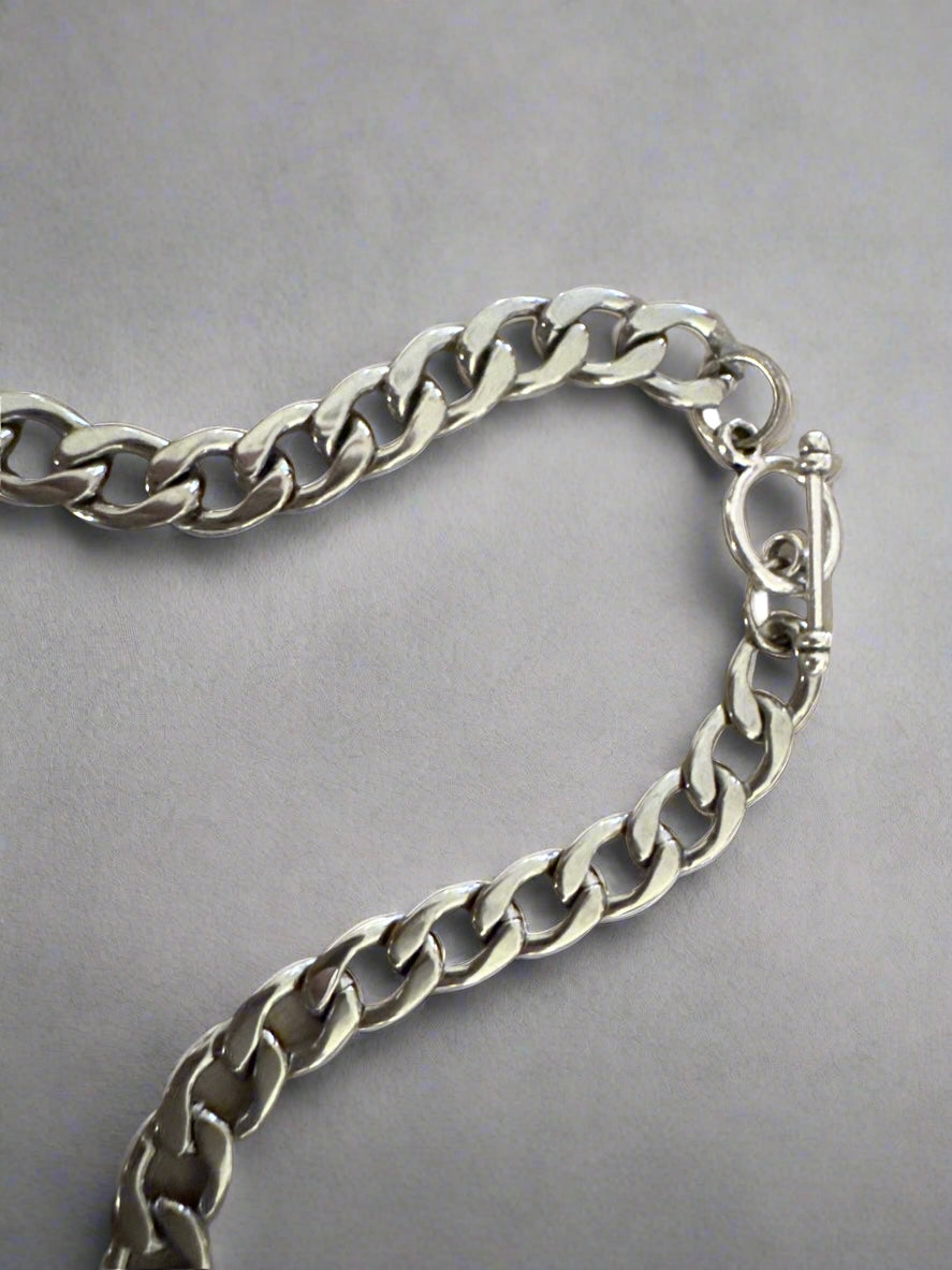 Repurposed Prada Triangle Necklace // Honeypot: New + Vintage High Quality Western Wear